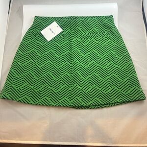 forever 21! Green/Black skirt with two front small pockets. Size small - NWT!